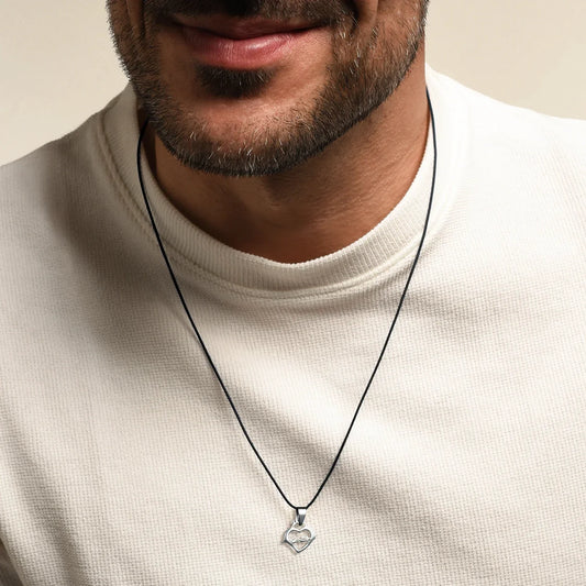SACRED HEART OF JESUS NECKLACE - RUBBER CORD AND STEEL